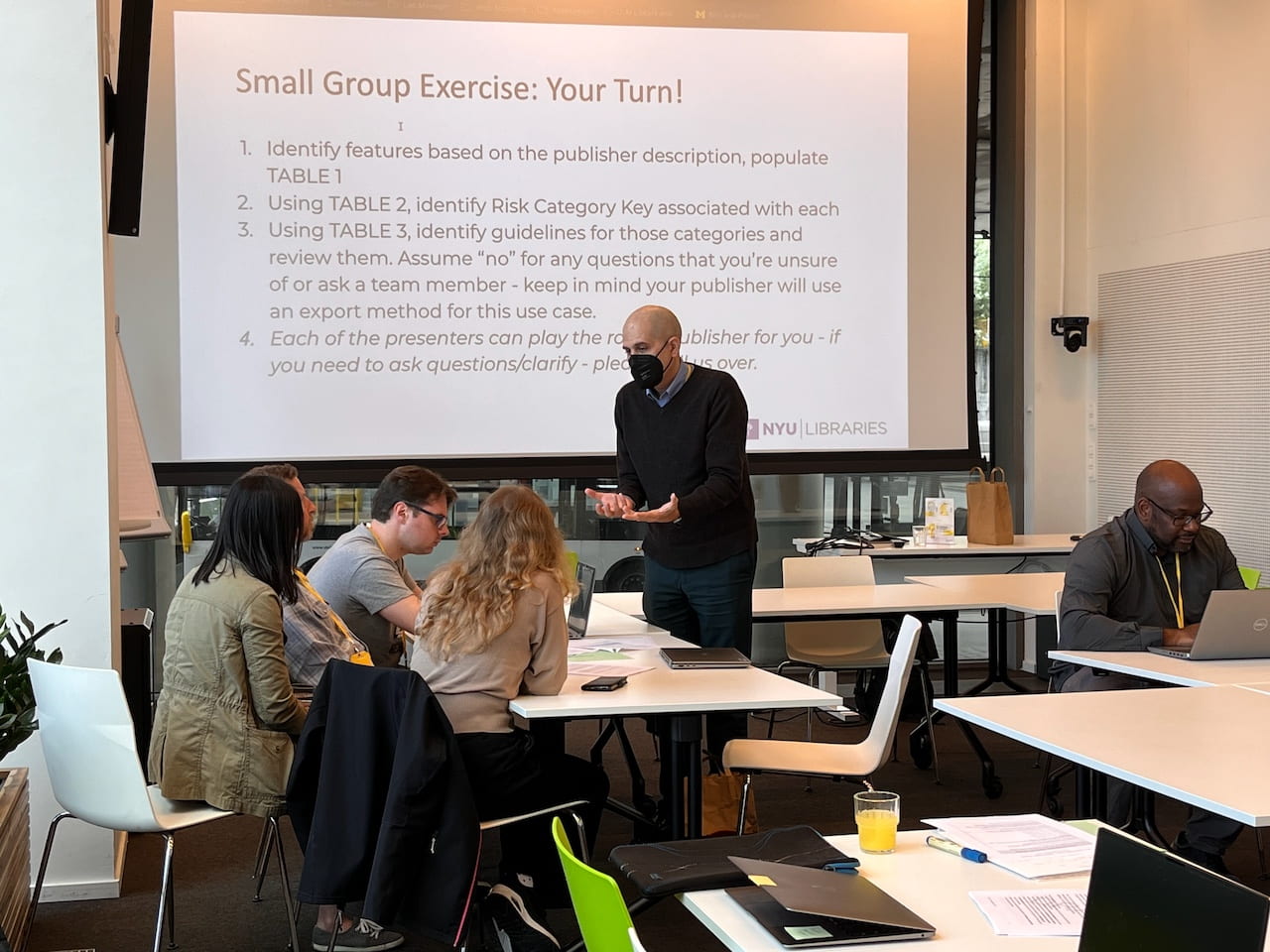 Participants worked in small groups using the Self-Assessment tool. Embedding Team member Jonathan Greenberg answers one small group